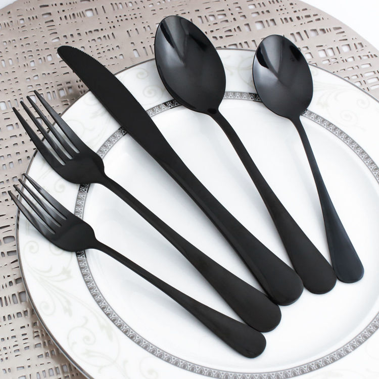 Reflective black flatware - cutlery - stainless steel - on plate