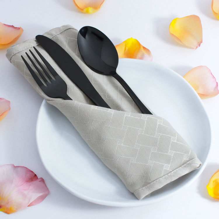 Reflective black flatware - cutlery - stainless steel - in napkin - rose petals